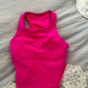 LULULEMON sonic pink invigorate tank top. The perfect tennis playing tank!